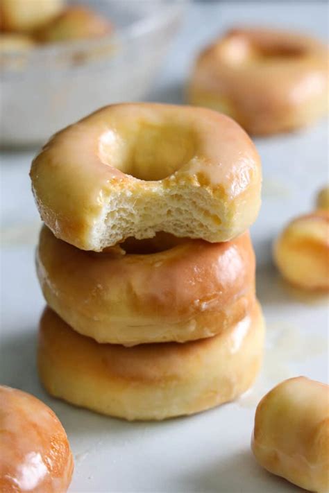 Preheat Air Fryer to 350 degrees F. . Spray the basket with oil spray, transfer the donuts to the Air Fryer basket in a single layer and make sure they do not overlap and there is a 1-inch distance between them. . Spray donuts with oil spray and cook for 4-5 minutes or until golden brown.